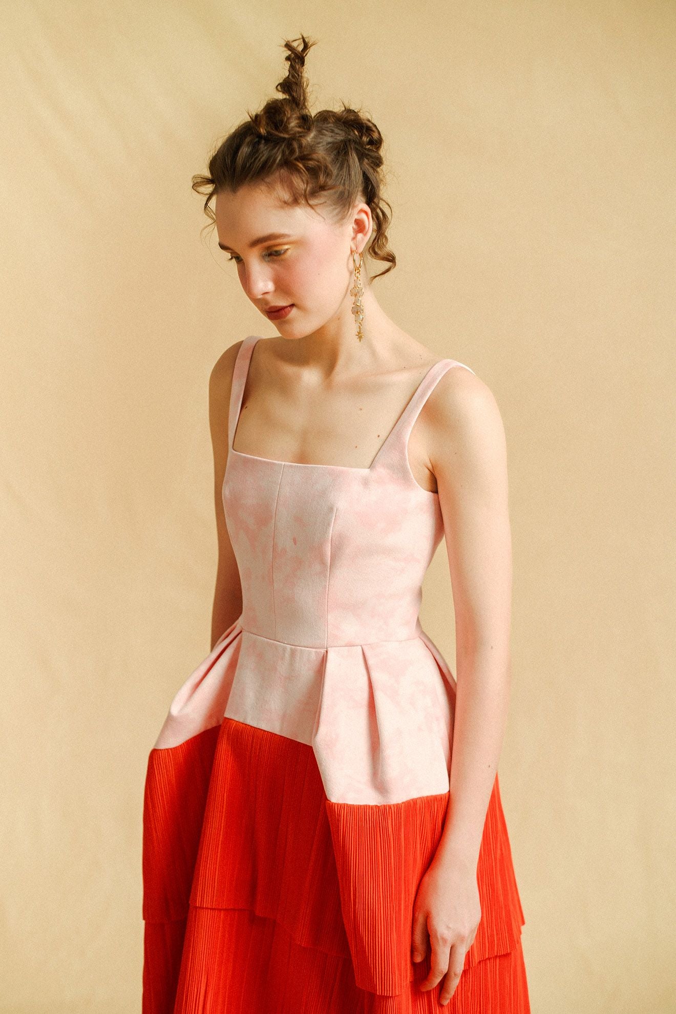 REVERIE Dress in Dusty Pink/Orange Pleats